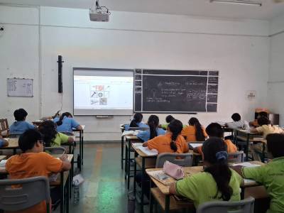 Students developing independent learning skills in a modern classroom